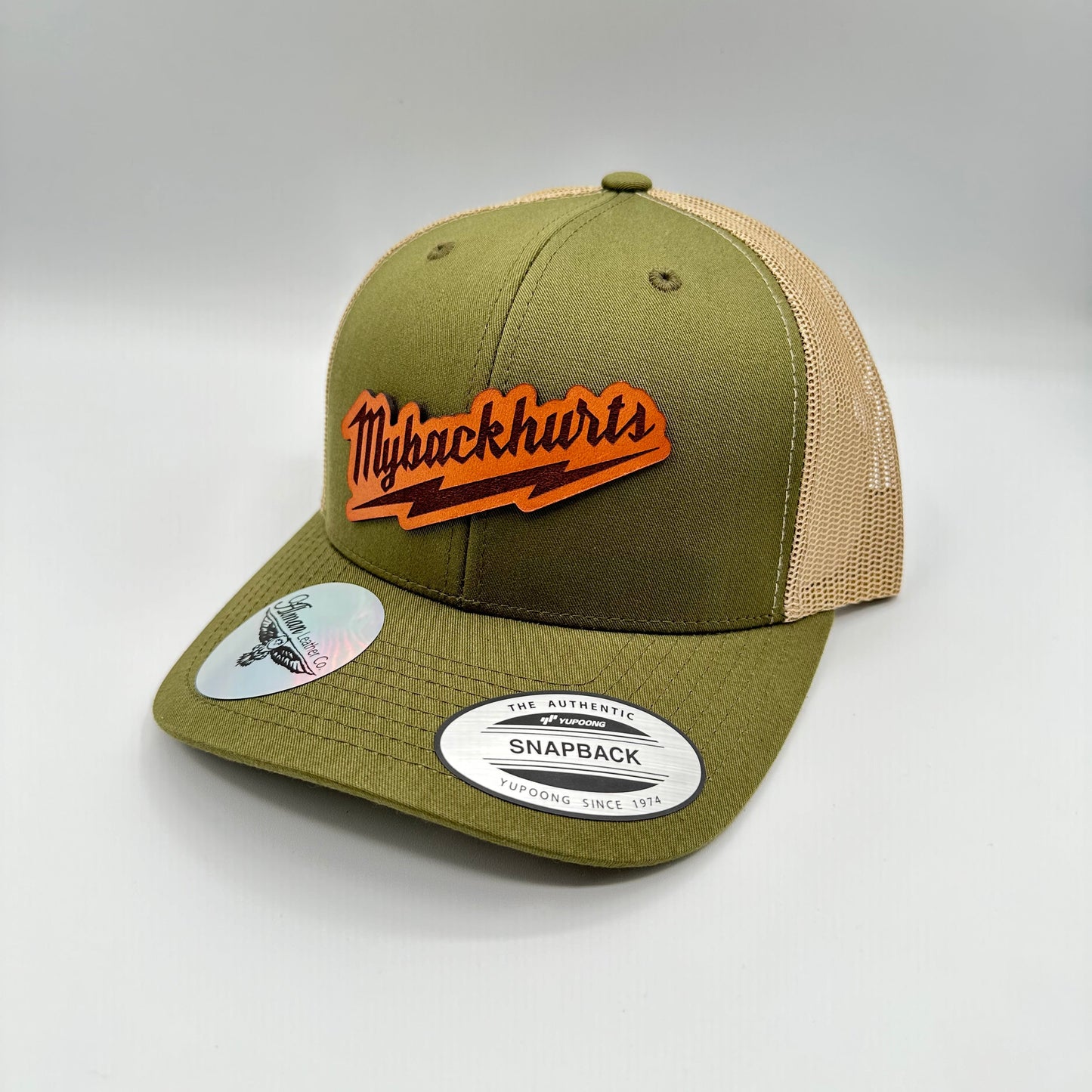 My backhurts leather patch hat